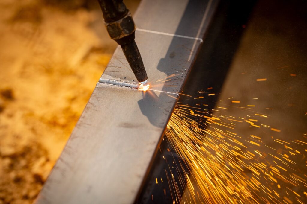 Sparks flying from welding materials